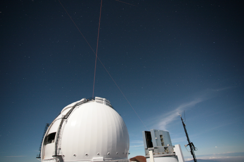 Photo of Keck I laser in operation (outside)